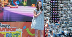 Libby Rue from Alice’s Wonderland Bakery performs the series theme song during Disney Junior Fun Fest