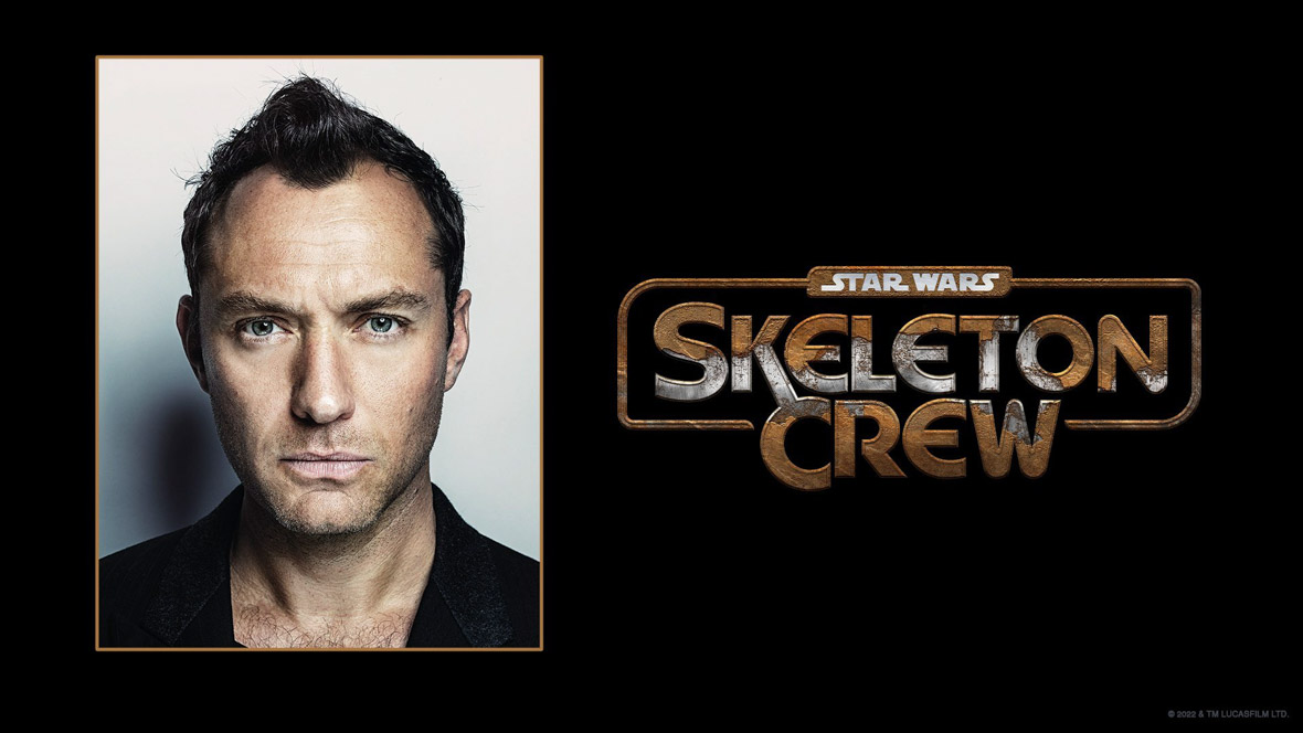 A headshot of Jude Law, a serious expression on his face. To his right is the orange and white logo for Star Wars: Skeleton Crew