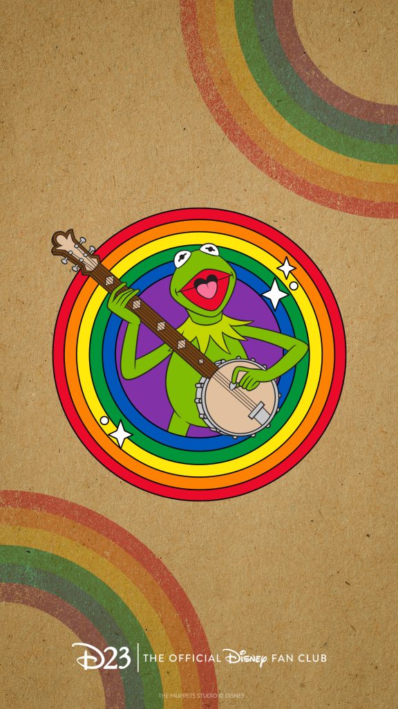Kermit the Frog play his banjo against a circular rainbow background. The rainbow pattern is repeated in a faded background across the space of the phone wallpaper.