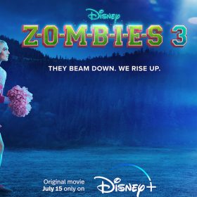 In a promo image for ZOMBIES 3, Milo Manheim as zombie Zed (with green hair) and Meg Donnelly as cheerleader Addison (in her cheer uniform) stand on one side, and three aliens all dressed in futuristic outfits, including Matt Cornett as A-lan, standing on the other side under the bright lights of a spaceship. There are tree-covered hills in the background.