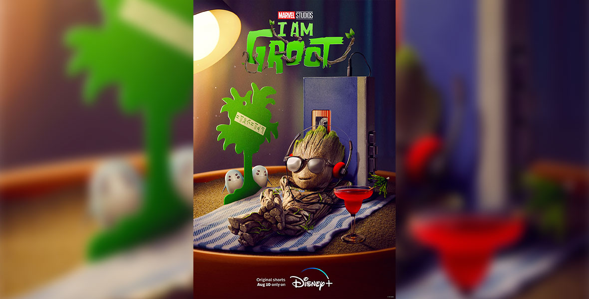 In the poster for the Disney+ and Marvel Studios series I Am Groot, Baby Groot is wearing headphones and sunglasses and is relaxing against his cassette tape player, arms behind his head and legs crossed, with a drink by his side and a “tree” made from a car air freshener nearby. A lamp is acting as the “sun,” in the upper left of the image.