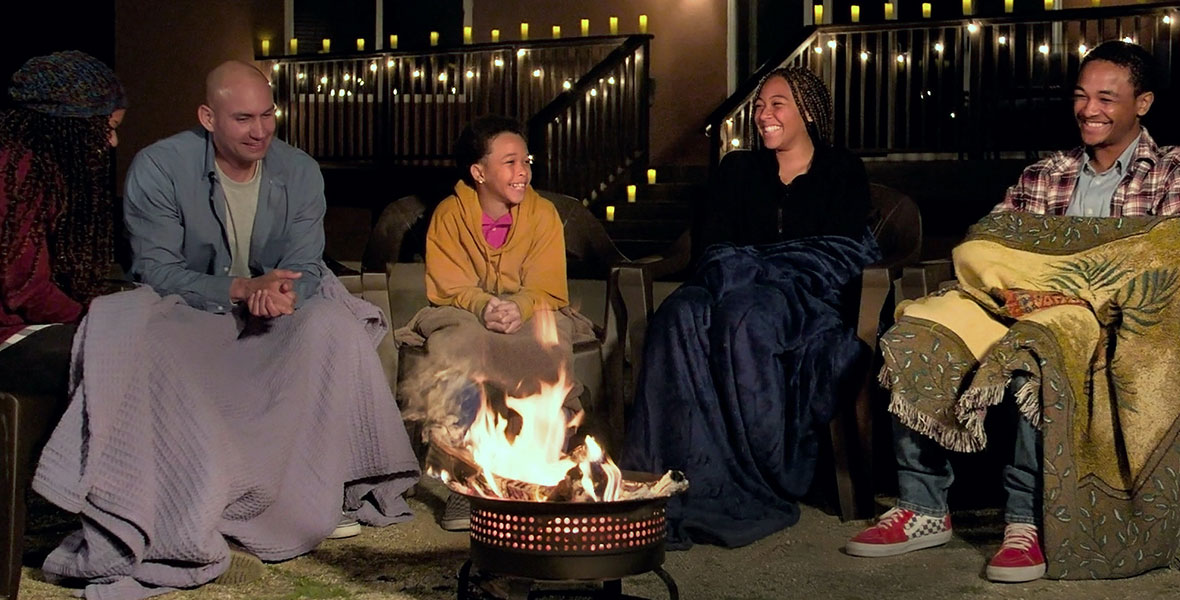The Hernandez Family reconnects during a series of fun games on a journey in the desert while sitting around a fire on the series Family Reboot.