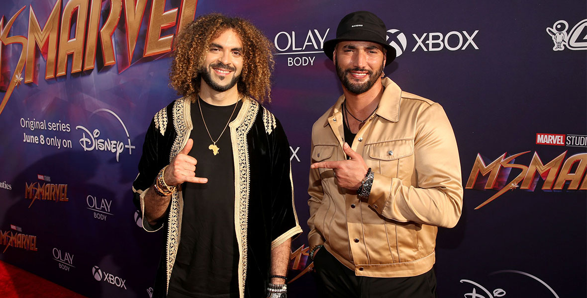 Directors and executive producers Adil El Arbi (left) and Bilall Fallah (right), playfully pose together at the premiere of Ms. Marvel at the El Capitan Theatre in Hollywood.