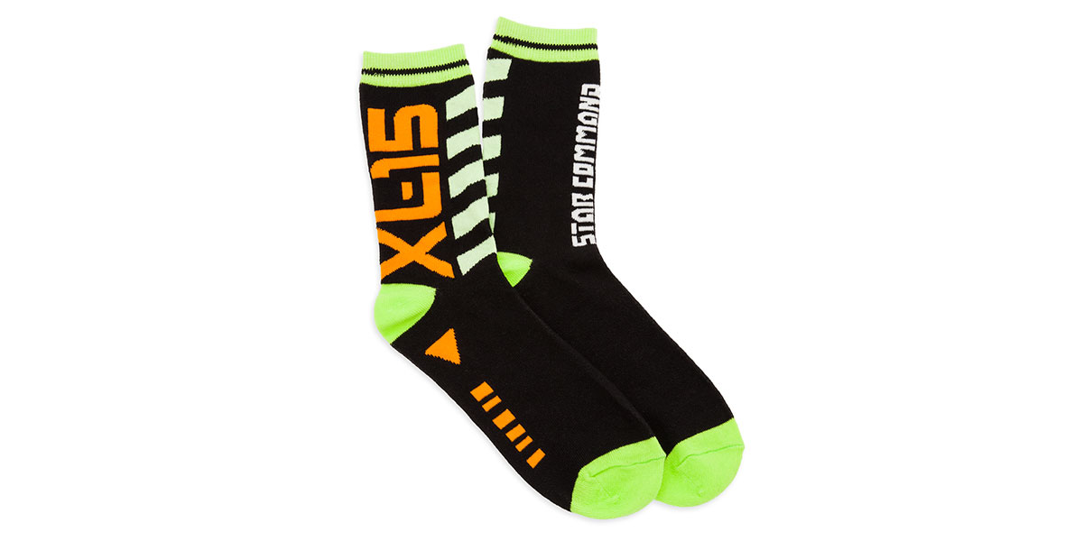 Black socks with green accents feature the logos for Buzz Lightyear’s XL-15 spaceship in orange and the Star Command logo in white.