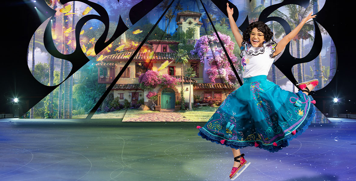 Mirabel is jumping in the air while ice skating. Behind her is a screen showing the Casita from Encanto.