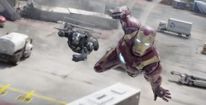 Iron Man and War Machine in mid flight with the airport behind them.