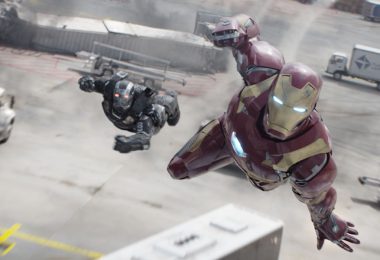 Iron Man and War Machine in mid flight with the airport behind them.