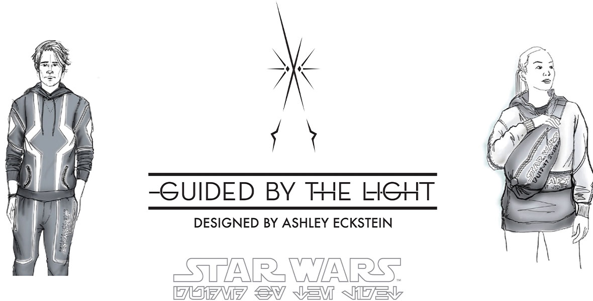 Logo for Guided by the Light collection, designed by Ashley Eckstein. Features black and white sketched concept art of a man wearing a stylized hooded jacket and matching pants on the left. On the right there is a woman wearing a Star Wars branded jacket and shoulder bag that reads “Star Wars” in English and Aurebesh. The same “Star Wars” logo in English and Aurebesh is below the collection logo. 