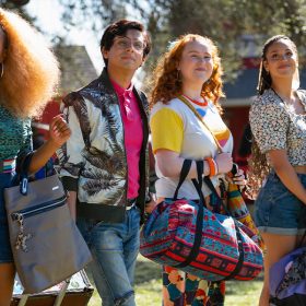 Dara Reneé, Frankie Rodriguez, Julia Lester, Sofia Wylie, and Matt Cornett star in the third season of High School Musical: The Musical: The Series. In this scene, they are standing at Camp Shallow Lake, suitcases in tow, and surveying the grounds.