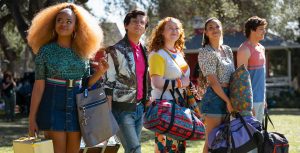 Dara Reneé, Frankie Rodriguez, Julia Lester, Sofia Wylie, and Matt Cornett star in the third season of High School Musical: The Musical: The Series. In this scene, they are standing at Camp Shallow Lake, suitcases in tow, and surveying the grounds.