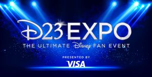 The logo for D23 Expo: The Ultimate Disney Fan Event, Presented by Visa floats over a dark blue stage lit by light blue spotlights and glitter floating in the air.