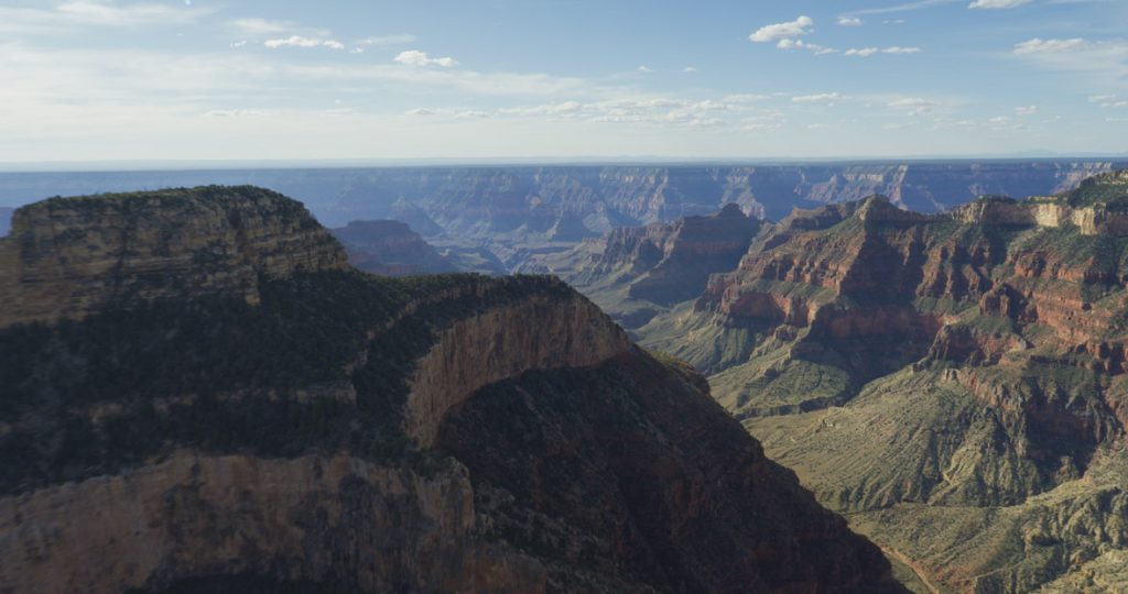 In a scene from National Geographic’s America the Beautiful on Disney+, a fighter jet fitted with a gyro-stabilized camera flies close to speed of sound to capture Grand Canyon National Park in a way that it’s never been seen before.