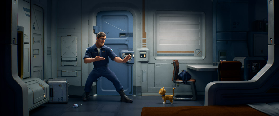 Buzz is standing in a martial-arts pose, looking down at Sox the cat robot companion, in a still from Disney and Pixar’s Lightyear. They are inside some sort of living quarters. There’s a blue door behind Buzz, and a table and desk to the right of him. He’s wearing a blue jumpsuit.