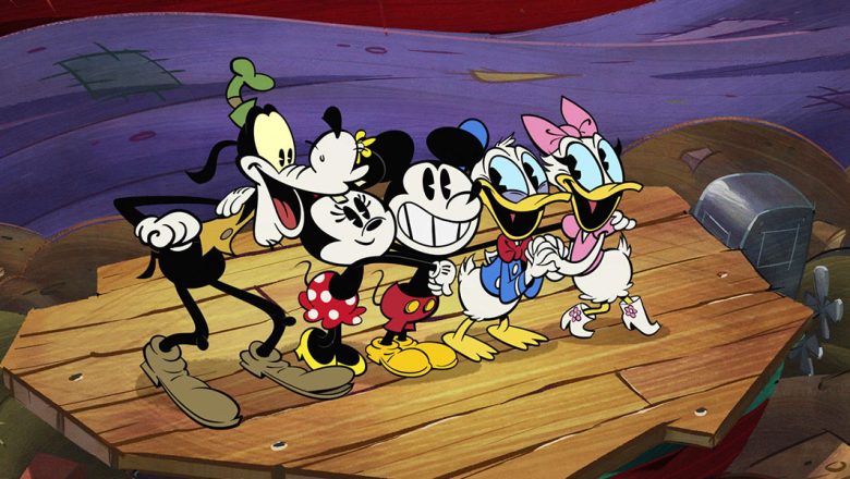 (Left to right) Goofy, Minnie Mouse, Mickey Mouse, Donald Duck, and Daisy stand together in a line on a wooden dock.