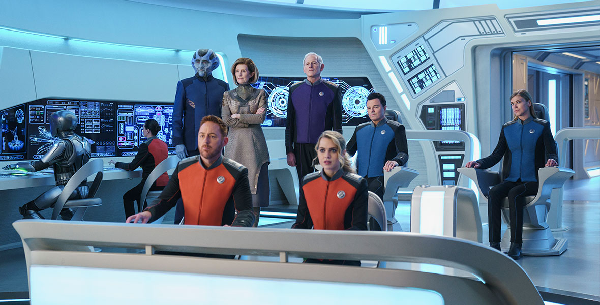 The crew of the U.S.S. Orville sit aboard their ship, at full attention.