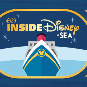 The D23 Inside Disney at Sea logo, featuring an illustration of a Disney Cruise ship sailing on blue water below a sky of sparkles. In the sky in yellow text is the title D23 Inside Disney at Sea. The text and image are enclosed in a yellow oval and flanked on either side by a series of yellow stripes on a dark blue background.