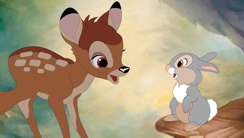Bambi stands between Thumper (left) and Flower (right) in a field of pastel flowers. Bambi is a fawn and has medium brown hair with lighter spots and a black nose. Thumper is a rabbit with a light gray coat with brown and white spots. Flower is a black and white skunk with big blue eyes.