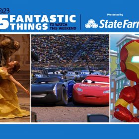 Actor Dan Stevens, portraying the Beast with CGI fur and horns, dips actor Emma Watson, portraying Belle, while dancing in a grand ballroom. Stevens wears a blue suit jacket with ornate sleeves. Watson wears a yellow ballgown with three tiers and her hair partially pulled back. Animated cars Jackson Storm and Lightning McQueen are side by side and surrounded by cars that are journalists and fans. McQueen gives a side-eye glance to Storm. Animated character Iron Man poses with one arm on his hip and his left fist in the air. Iron Man wears his red and gold super suit, and there is a row of colorful apartment buildings behind him.