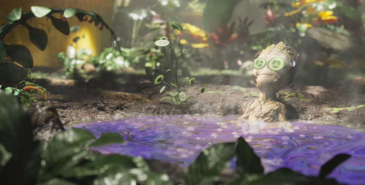 Baby Groot, a tree-like creature, sits in a bright purple hot tub-like pit cucumbers on his eyes and surrounded by green foliage