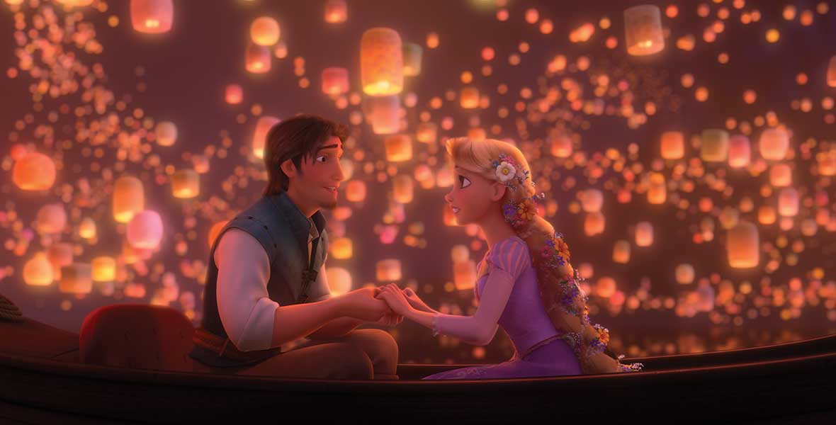 Animated characters Flynn Rider and Rapunzel hold hands and sit facing each other in a wooden rowboat. Thousands of lit lanterns float above their heads.
