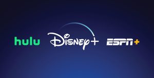 Three logos against a blue background: The Hulu logo in blocky green text, the Disney+ logo in the white Disney cursive font with a blue arc above the word "Disney" that connects to the plus sign, and the ESPN+ logo in a stylized blocky white text with the plus sign in yellow