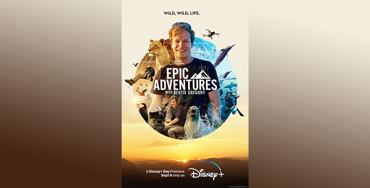 Bertie Gregory smiles in the center of the poster for Epic Adventures with Bertie Gregory. In the circular graphic, he is surrounded by images of himself scuba diving, operating a camera, rock climbing, etc. He is also surrounded by wildlife, including sea lions, penguins, lions, dolphins, bats, and more.