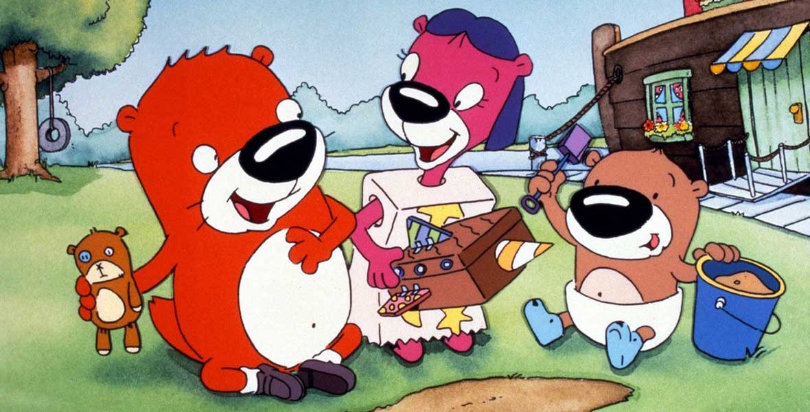 The characters of PB&J Otter play with a teddy bear, a homemade rocket ship, and sand shovel.