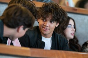 Actor Naveen Paddock leans in to talk to castmate Brady Noon during the premiere event for the second season at Honda Center in Anaheim, California.