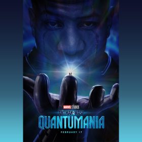 The blue-hued face of actor Jonathan Majors, portraying Marvel villain Kang, fills most of the new poster for Marvel Studios’ Ant-Man and The Wasp: Quantumania. Majors has his gloved hand outstretched, and two tiny figures are standing on one of his fingers. He is looking down at them, and there is a bright light coming from behind them. The logos for both the film and for Marvel Studios are seen at the bottom of the image, as well as the words “February 17.”