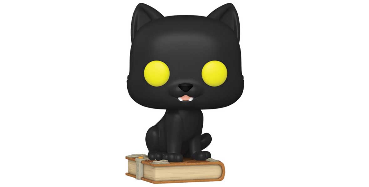 A black cat Funko Pop, with bright yellow eyes, sits on a spell book.