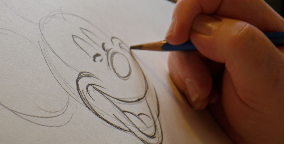 Animator Eric Goldberg sketches Mickey Mouse on white paper.