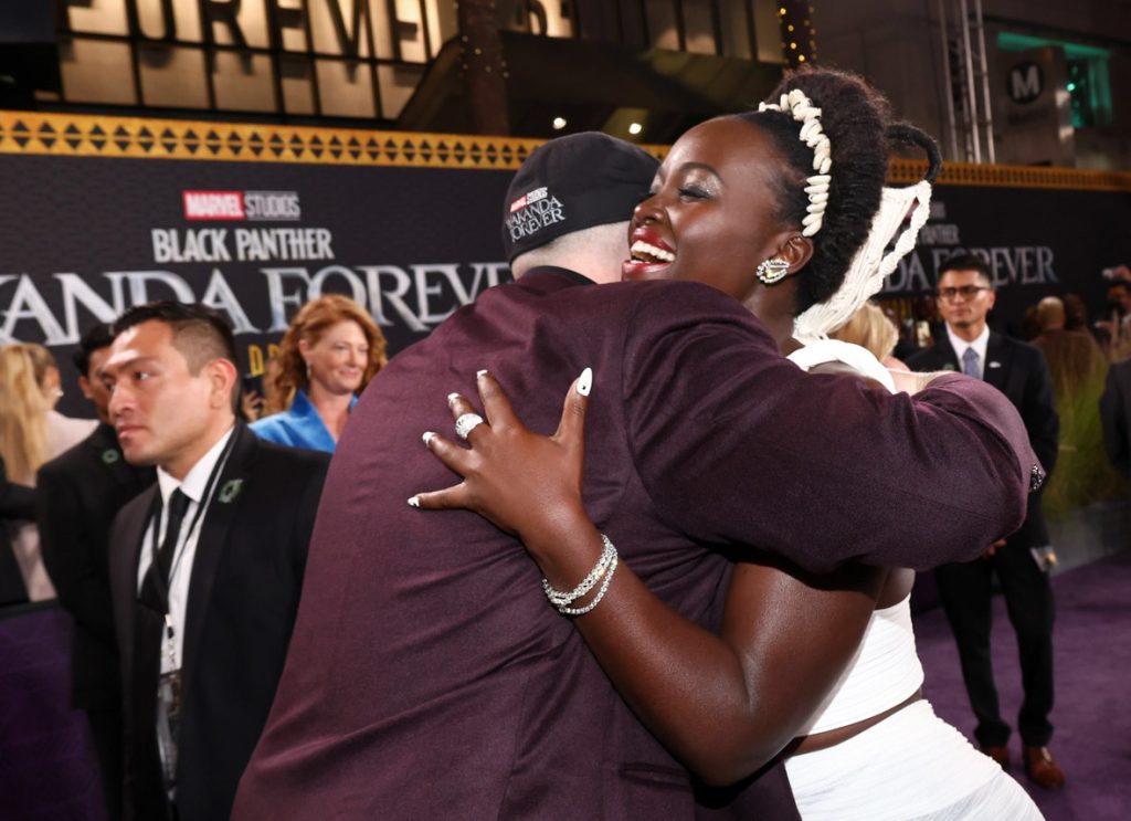 LOS ANGELES, CALIFORNIA - OCTOBER 26: (L-R) Kevin Feige, President and Chief Creative Officer of Marvel Studios, and Lupita Nyong'o attend the Black Panther: Wakanda Forever World Premiere at the El Capitan Theatre in Hollywood, California on October 26, 2022. (Photo by Tommaso Boddi/Getty Images for Disney)