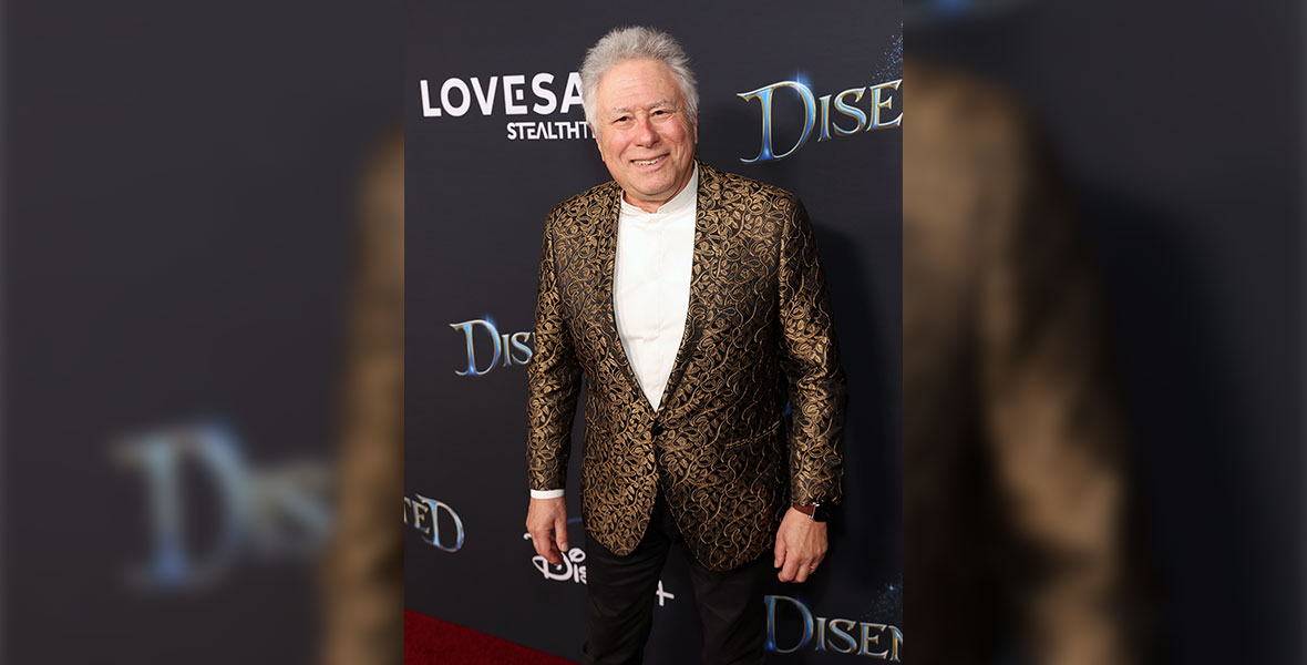 Disney Legend Alan Menken in front of the step and repeat for the Disenchanted world premiere.