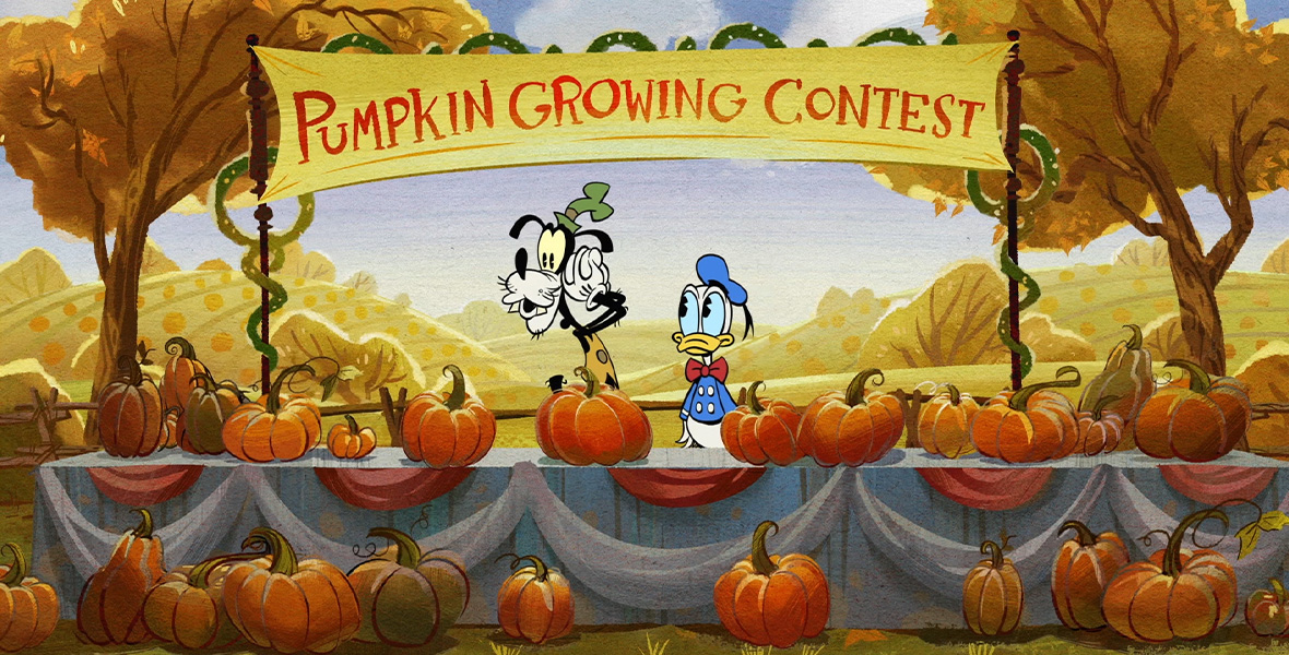 In a scene from The Wonderful Autumn of Mickey Mouse, Goofy and Donald Duck stand behind a long table covered in orange pumpkins. Above their heads, a large yellow banner reads, “PUMPKIN GROWING CONTEST” in red. Behind them are large autumnal trees covered with yellow and orange leaves. Goofy holds his hands up by his head and wears a green hat and tan vest. Donald wears a blue hat and blue shirt with a red bow tie.
