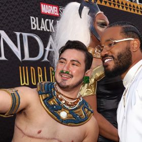 Director Ryan Coogler poses with a Black Panther fan in Hollywood.