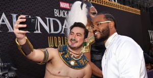 Director Ryan Coogler poses with a Black Panther fan in Hollywood.