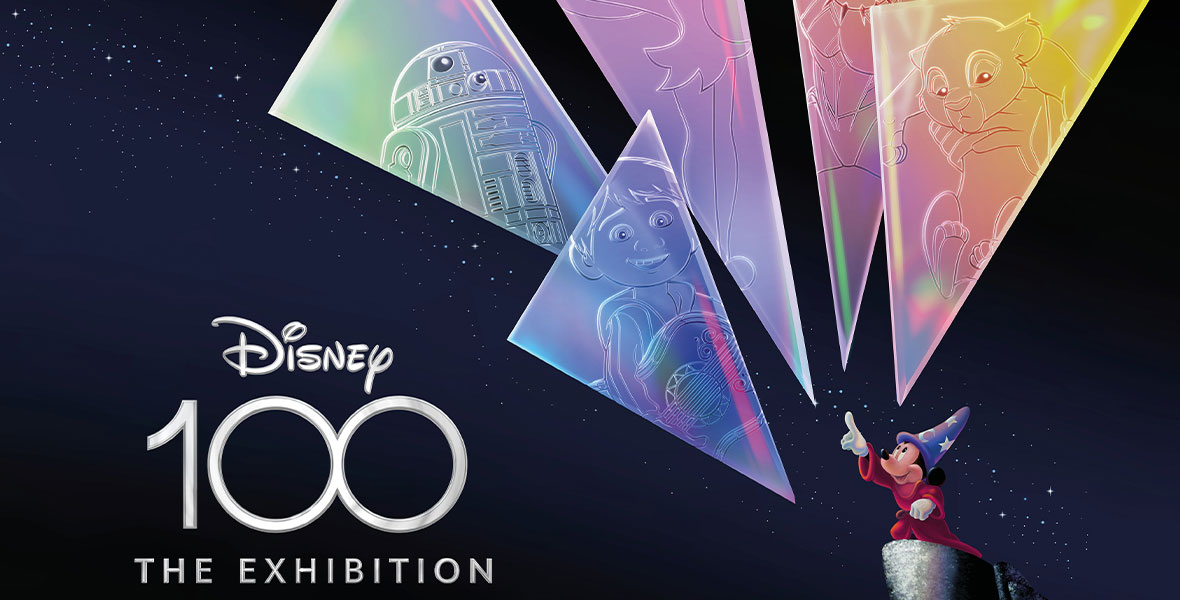 The poster for Disney100: The Exhibition depicts Mickey Mouse in his Sorcerer’s Apprentice costume with one arm raised as he appears to conjure five glass fractals that float above him. Inside the fractals are images of R2-D2 from Star Wars, Miguel from Disney and Pixar’s Coco, Tinker Bell from Peter Pan, Marvel Studios’ Black Panther, and baby Simba from The Lion King.