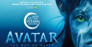 An official poster from The Nature Conservatory detailing the “Avatar Keep Our Oceans Amazing” campaign features a striking close-up image of a Na’vi with half of her face visible.