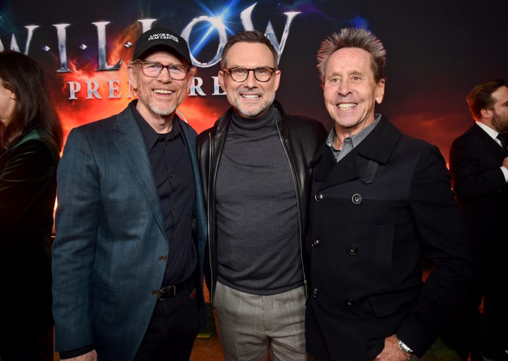LOS ANGELES, CALIFORNIA - NOVEMBER 29: (L-R) Ron Howard, Christian Slater, and Brian Grazer attend Lucasfilm and Imagine Entertainment's "Willow" Series Premiere in Los Angeles, California on November 29, 2022. The series debuts exclusively on Disney+ November 30, 2022. (Photo by Alberto E. Rodriguez/Getty Images for Disney )