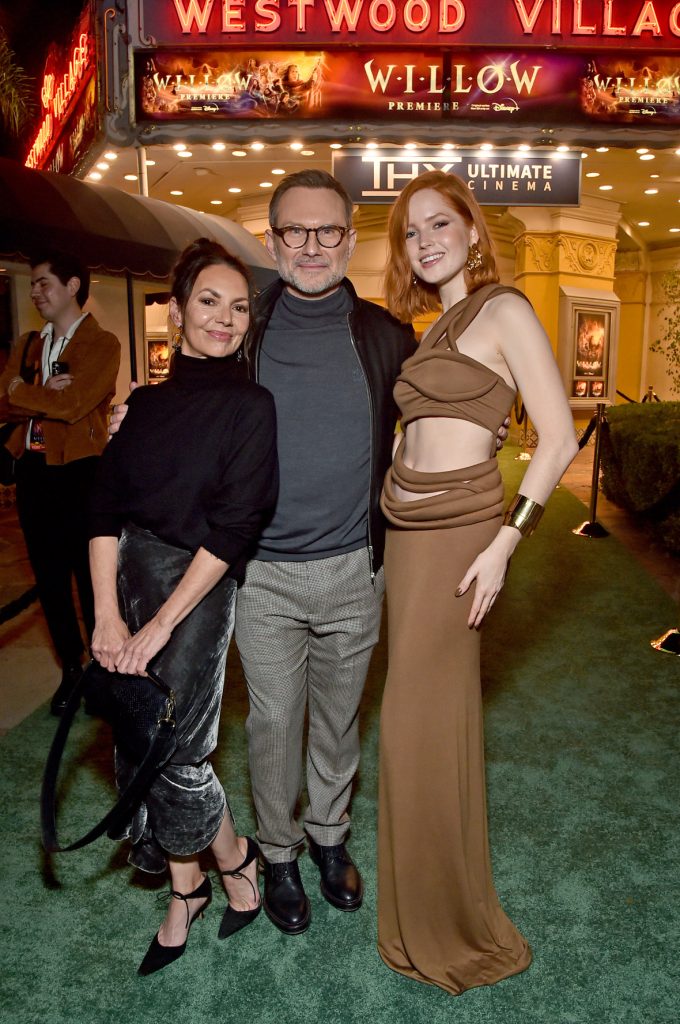 LOS ANGELES, CALIFORNIA - NOVEMBER 29: (L-R) Joanne Whalley, Christian Slater, and Ellie Bamber attend Lucasfilm and Imagine Entertainment's "Willow" Series Premiere in Los Angeles, California on November 29, 2022. The series debuts exclusively on Disney+ November 30, 2022. (Photo by Alberto E. Rodriguez/Getty Images for Disney )