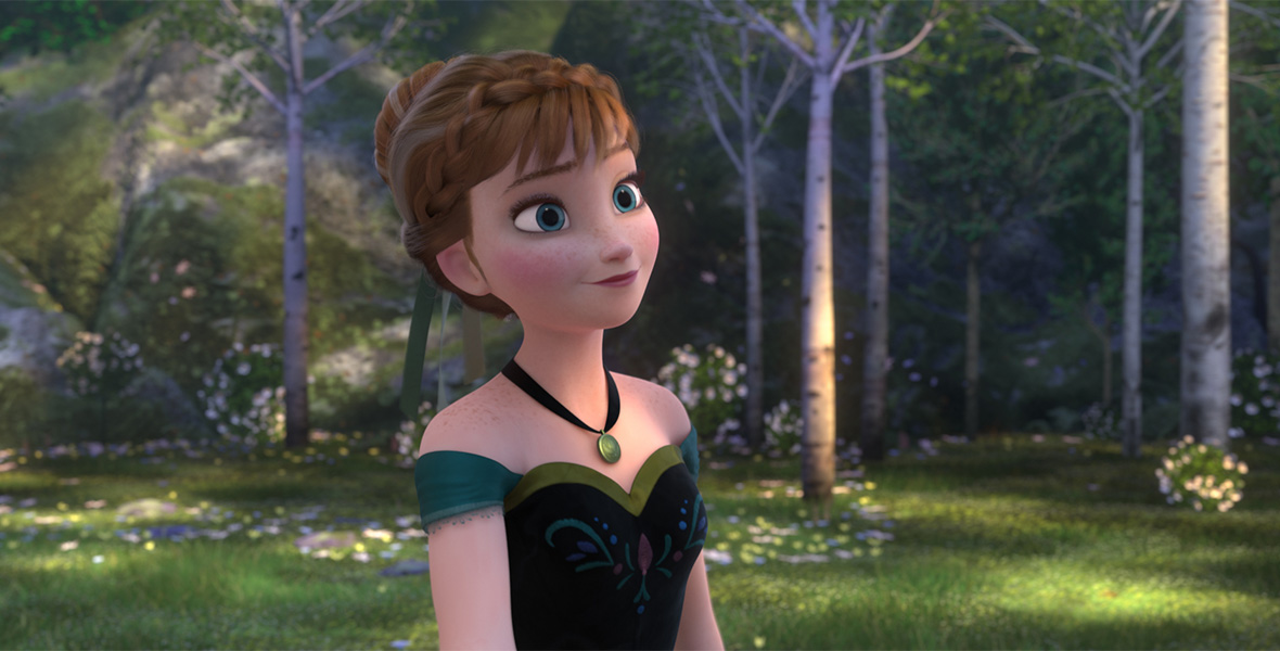 Anna from Frozen is wearing a black sweetheart neckline with green off-the-shoulder sleeves. She is standing in the woods.