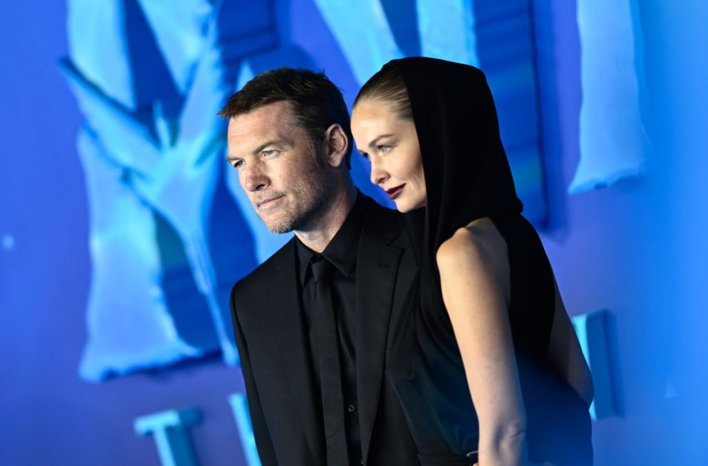 LONDON, ENGLAND - DECEMBER 06: Sam Worthington and Lara Worthington attend the world premiere of James Cameron's "Avatar: The Way of Water" at the Odeon Luxe Leicester Square on December 06, 2022 in London, England. (Photo by Gareth Cattermole/Getty Images for Disney)