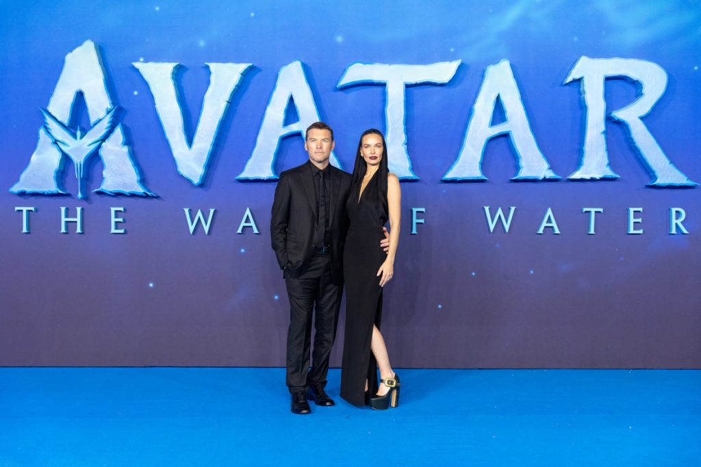 Sam Worthington and Lara Worthington attend the World Premiere of James Cameron's "Avatar: The Way of Water" at the Odeon Luxe Leicester Square on December 06, 2022 in London, England. (Photo by StillMoving.net for Disney)