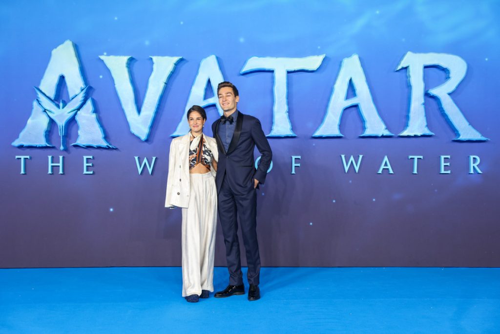 Guests Carmen Montero Mundt and George Russell attend the World Premiere of James Cameron's "Avatar: The Way of Water" at the Odeon Luxe Leicester Square on December 06, 2022 in London, England. (Photo by StillMoving.net for Disney)