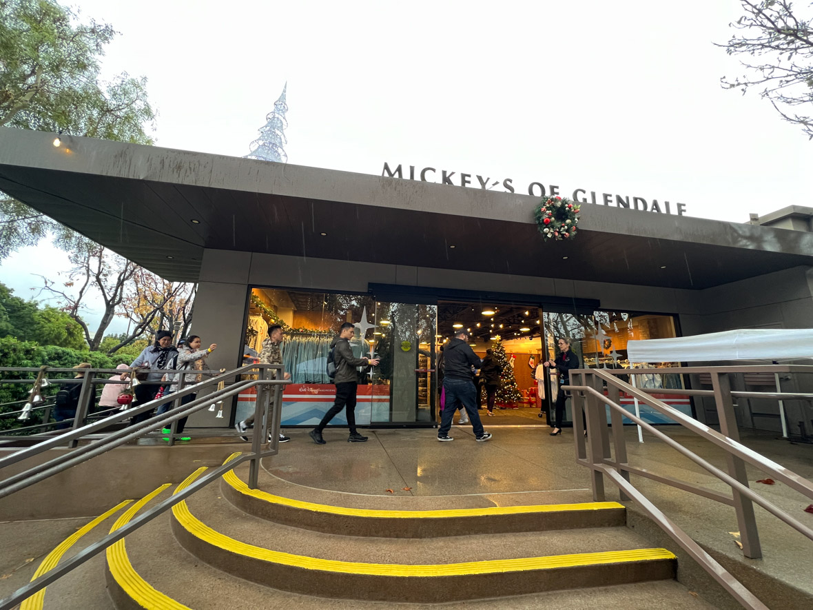 Front doors of Mickey’s of Glendale with guests going in; the building is grey with silver letters reading Mickey’s of Glendale on top.