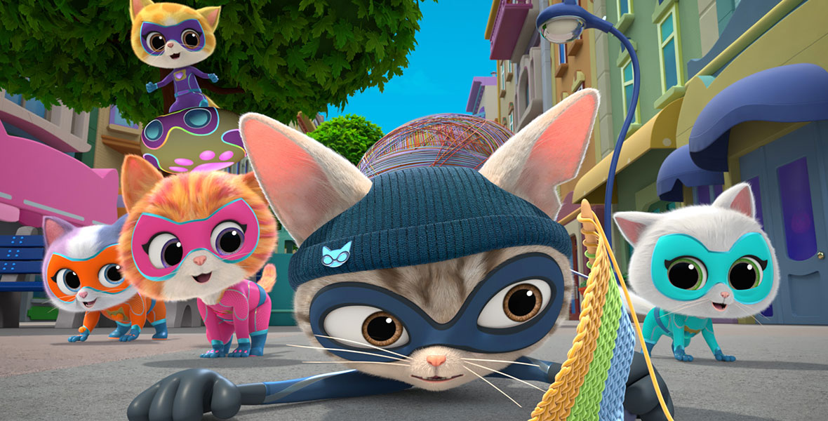 In a scene from the animated series SuperKitties, kittens wear colorful super hero masks and uniforms and walk down a city sidewalk.