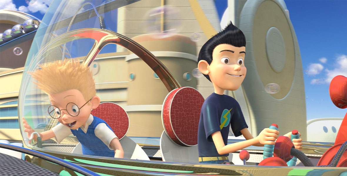 In a scene from Walt Disney Animation Studios’ Meet the Robinsons, a teen boy steers a futuristic flying vehicle while a preteen boy stares out the clear roof.