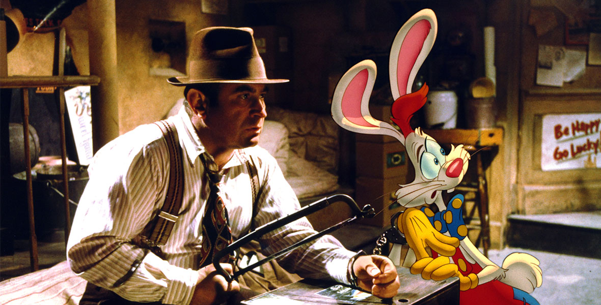 Roger Rabbit and Eddie Valiant are handcuffed together, looking off-screen in the 1988 film Who Framed Roger Rabbit?