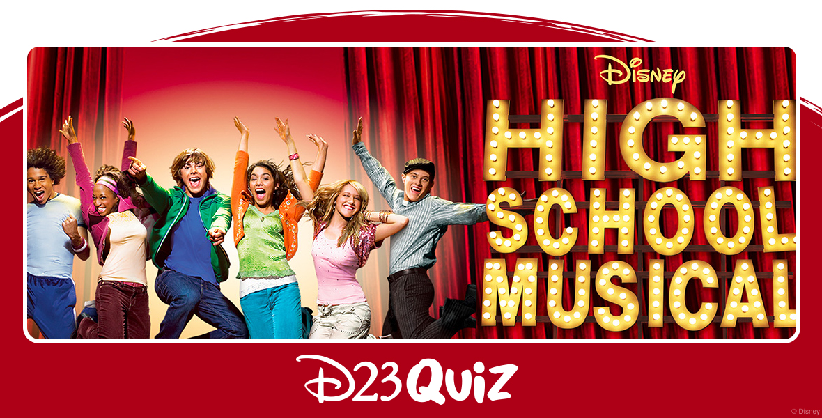 The promo poster for High School Musical featuring the entire cast. From left to right is Corbin Bleu, Monique Coleman, Zac Efron, Vanessa Hudgens, Ashley Tisdale, and Lucas Grabeel all jumping in the air with excited expressions on their faces. To their right is the High School Musical title treatment made out of theater letters lit up with lights. All of this sits in front of a red theater curtain.