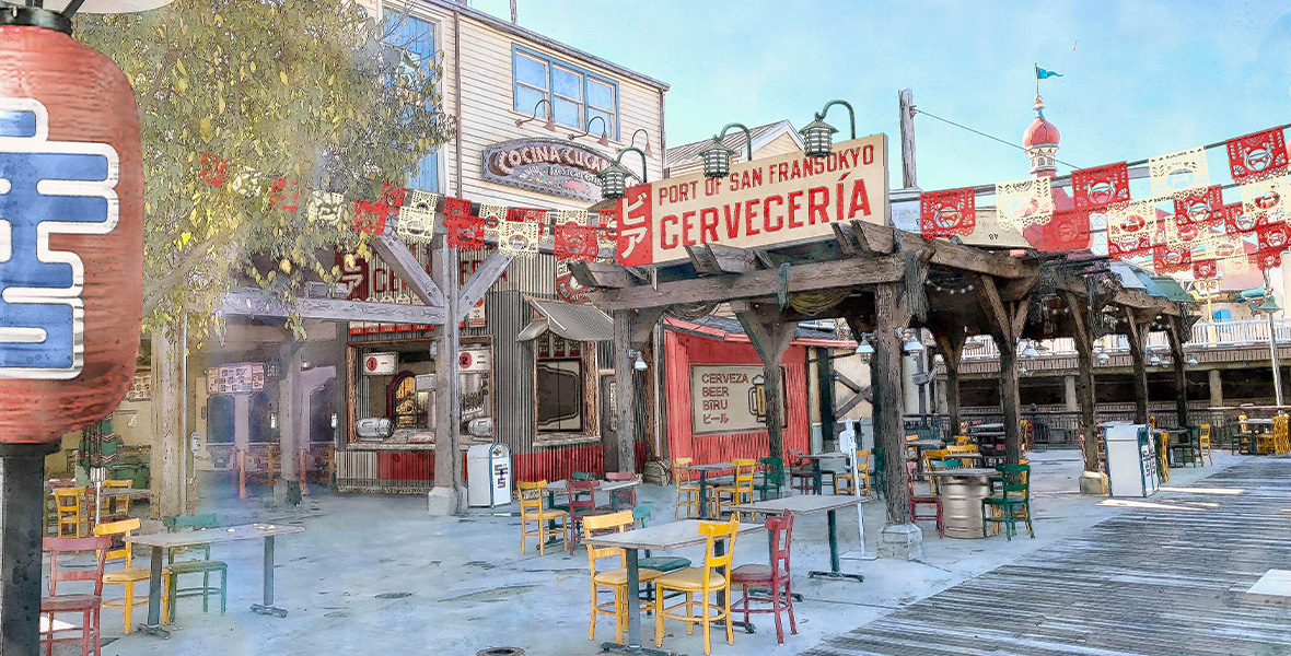 In concept art for San Fransokyo Square at Disney California Adventure Park at Disneyland Resort, the red and white sign for the new Port of San Fransokyo Cervecería restaurant is seen above a large seating area, filled with tables and chairs. It’s daytime, and red and white flags can be seen strung above the seating area; a tree can be seen to the left. Other restaurants can be spotted in the background.